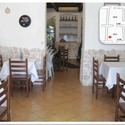 Vista della sala con i tavoli per i clienti posta sul lato sud del fabbricato (con ingresso dalla via Mazzini)